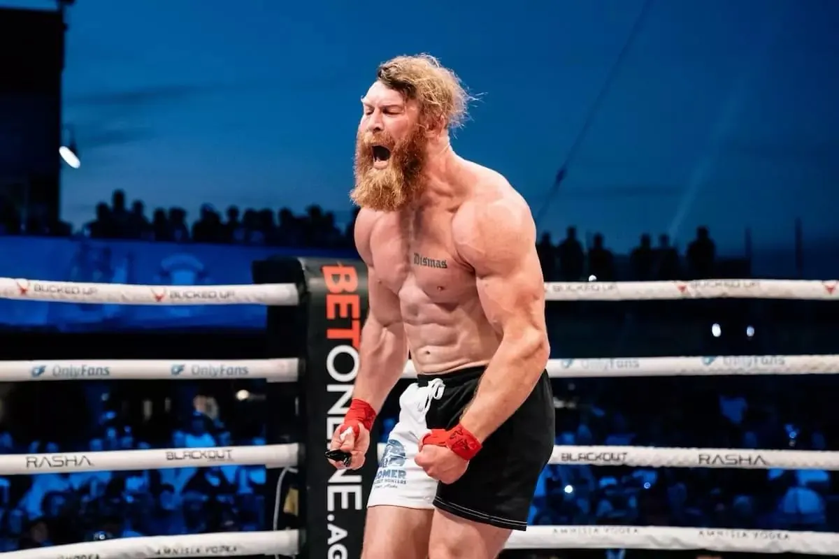 Aesir founder David Simpson roars after a win in the ring