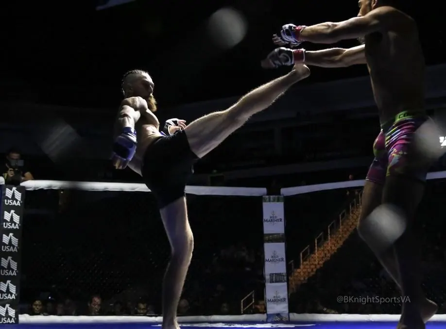 A head-height kick in the cage
